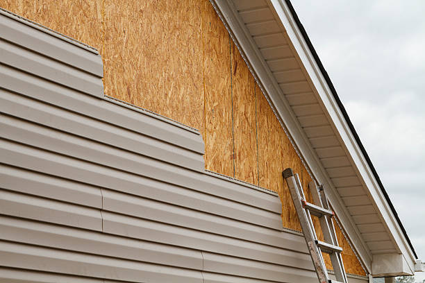 Professional Siding Replacement technician working in Northumberland, PA